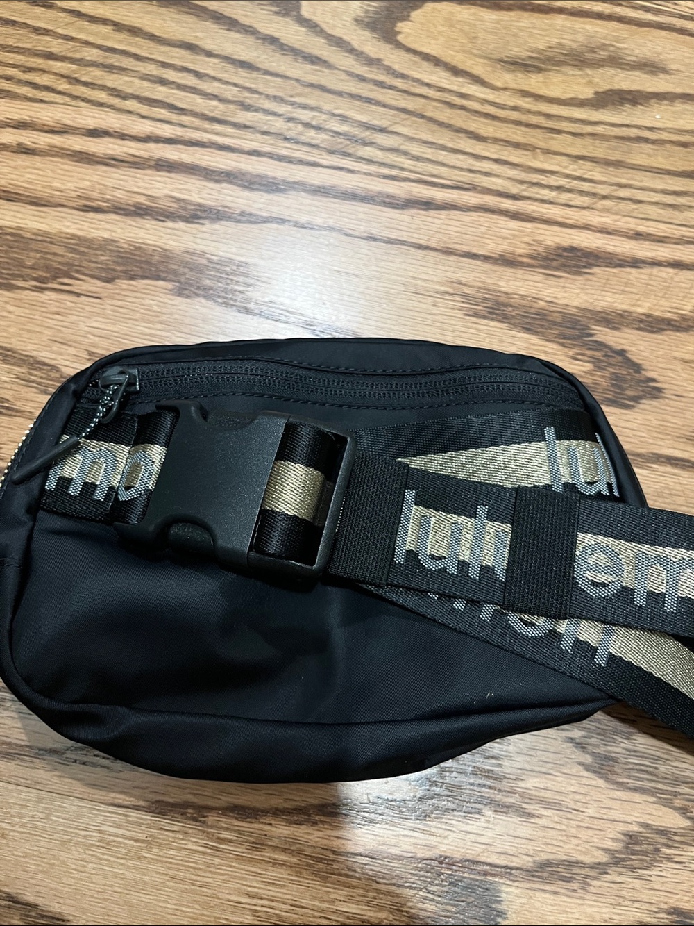 lululemon athletica Black Crossbody Belt Bag with gold striped Strap Detail - Picture 4 of 4